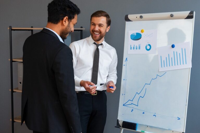 business-person-looking-finance-graphs (1)